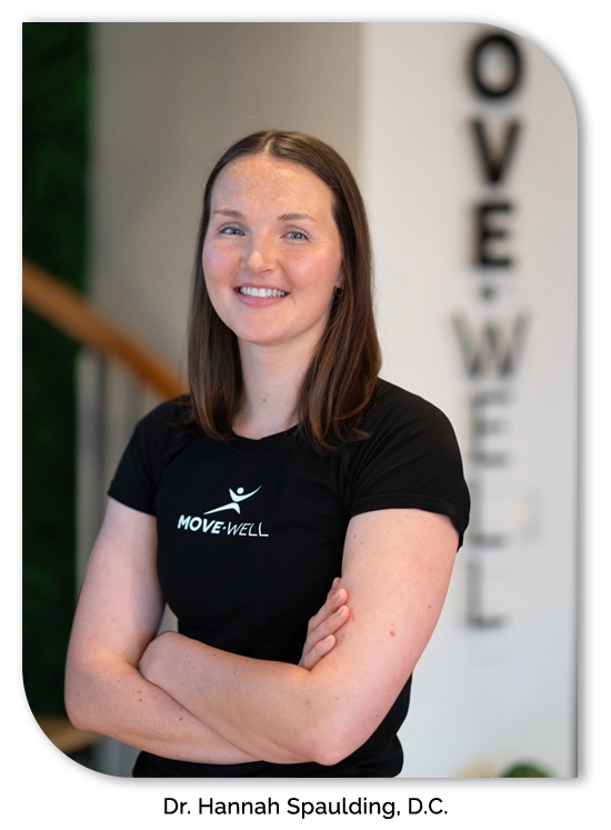 Chiropractor Hannah Spaulding smiling with her arms crossed.