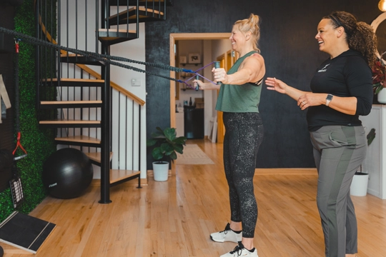 Whitney Rudesill with a rehab patient.