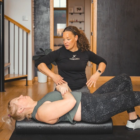 Chiropractor Whitney Rudesill with a patient.